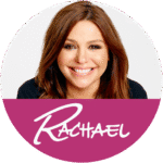 A woman with shoulder-length brown hair smiling, wearing a dark top, with a purple banner featuring.